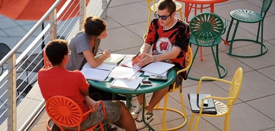 Graduate School | University of Wisconsin–Madison Students study outdoors during